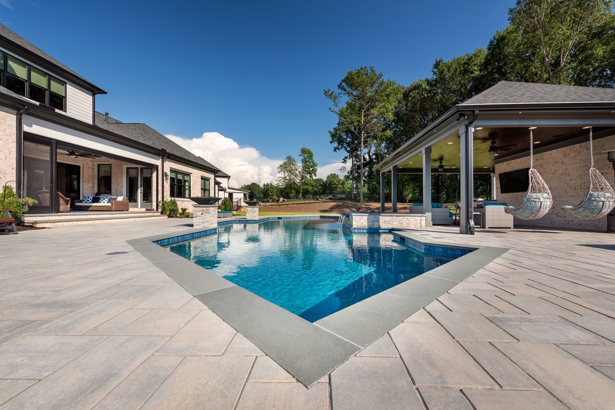 Poolside cabana with twin fire bowls and spa spillway, Braselton GA