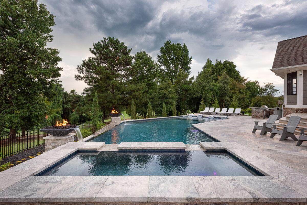 Twin fire bowl water features on infinity edge pool, Jefferson GA