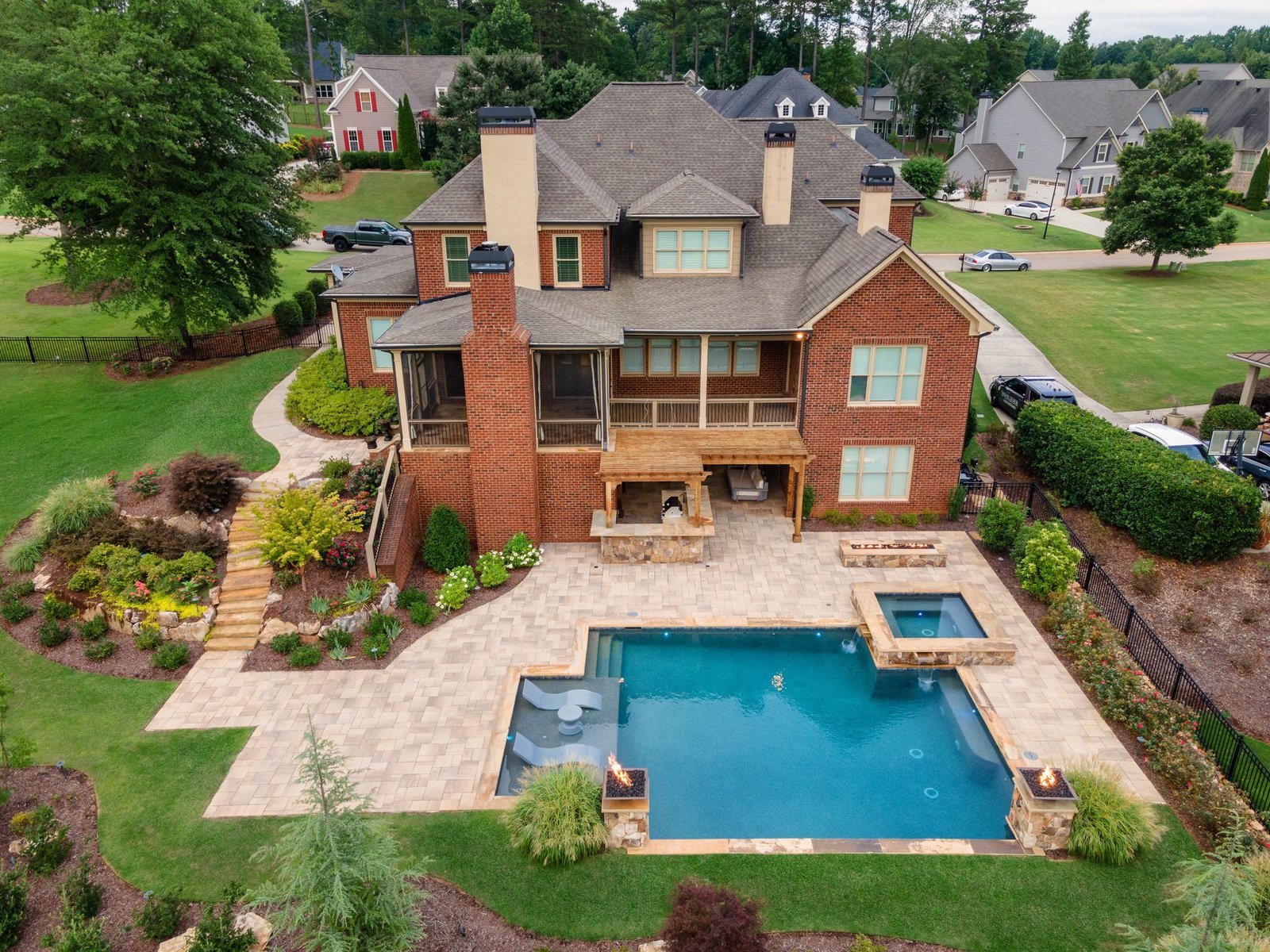 Aerial view of the full pool, spa, fire features and terrace, Traditions of Braselton, Jefferson GA